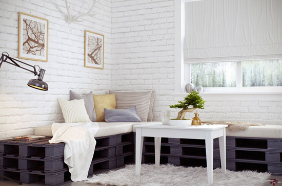 2-A-Magnificent-White-Interior-Space-Design-Has-Washed-Brickwork-A-Bonsai-Pallet-Sofa-A-Rectangle-Table-Colored-Pillows-An-Arm-Lamp-A-Hartshorn-Wall-A-Hairy-Rug-and-Picture-Frames