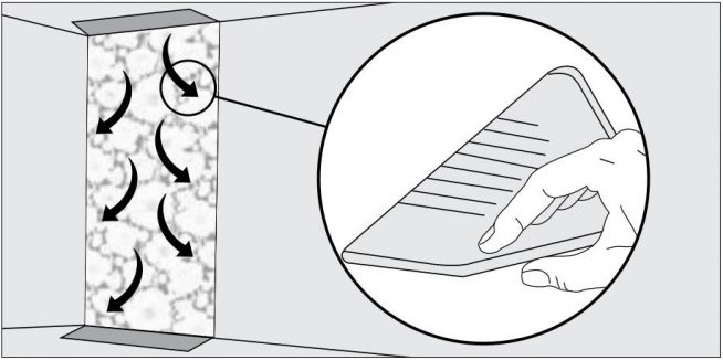 Направление разглаживания обоев резиновым или пластмассовым шпателем
