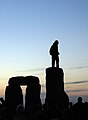 Stonehenge Summer Solstice man on stones.jpg